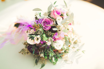 Wonderful luxury wedding bouquet of different flowers