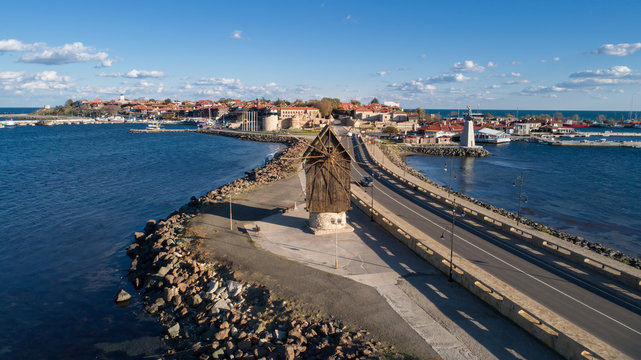 Old windmill at the entrance to the Old Town of Nessebar, ancient city on the Black Sea coast of Bulgaria. ?erial view.