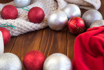 Christmas tree toys on a wooden table. Preparation for the New Year
