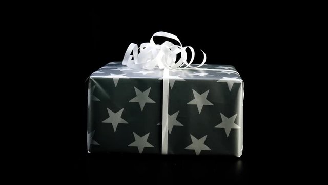 Christmas gift rotate against black background