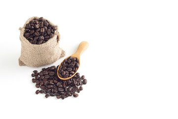 Coffee seeds in sack on white background