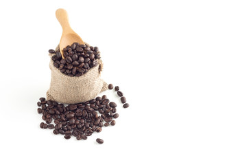 Coffee seeds in sack on white background