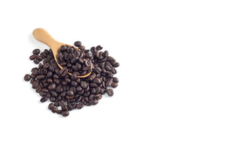 Fototapeta na wymiar Coffee seeds in wooden spoon on white background