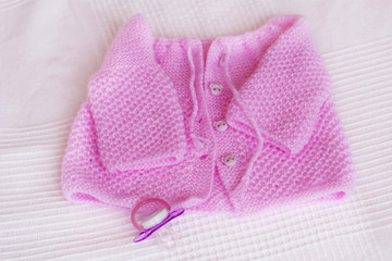 Obraz na płótnie Canvas Pink Baby Sweater