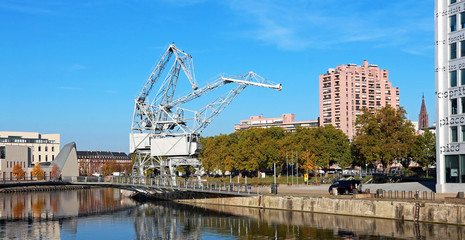 old port cranes + cathedral + building - Strasbourg