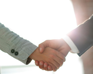 Business people shaking hands isolated on white background