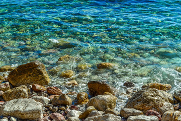 Sea. Large coastal rocks in the water near the shore