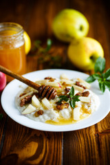 sweet milk oatmeal with apples, nuts and honey