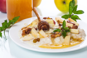 sweet milk oatmeal with apples, nuts and honey