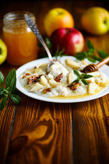 sweet milk oatmeal with apples, nuts and honey