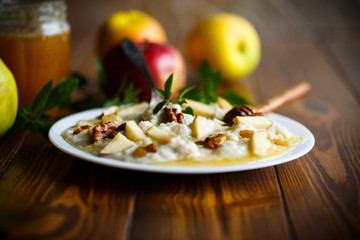 sweet milk oatmeal with apples, nuts and honey