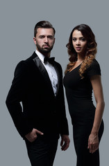 Business partners standing on a gray background