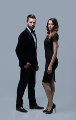 Business partners standing on a gray background