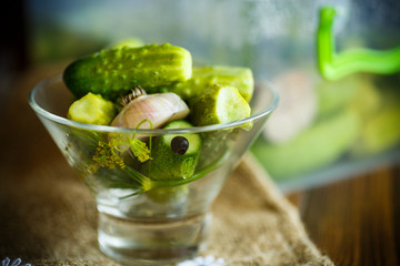 Pickled cucumbers in a glass bowl