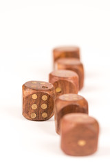 Selective focus on wooden gambling dice with individuality concept