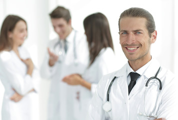 Fototapeta premium smiling doctor therapist on blurred background.