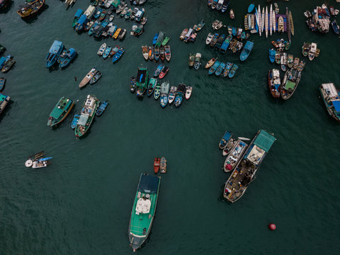 Aerial Top View Boat in The Aberdeen Bay, Famous Floating Village in Hong Kong