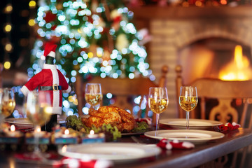 Christmas dinner at fire place and Xmas tree.