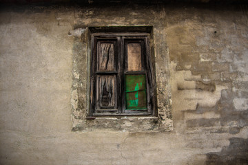 Old wooden window on a wall