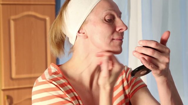 Woman getting beauty skin mask
