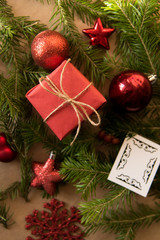 Christmas present wrapped in kraft paper with natural decoration