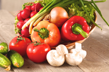 Pile of organic vegetables on a wooden table