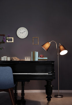 Modern room design with vintage piano