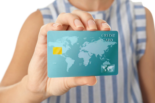 Woman holding credit card, closeup