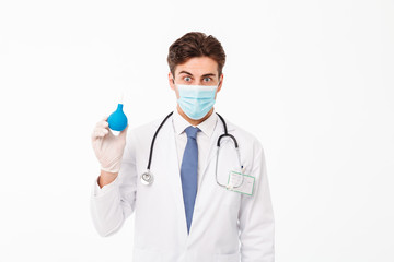 Close up portrait of a shocked young male doctor