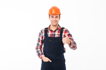 Portrait of a smiling young male builder