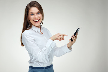 Fototapeta premium Smiling happy businesswoman using smart phone.