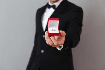 Close up portrait of a man dressed in tuxedo