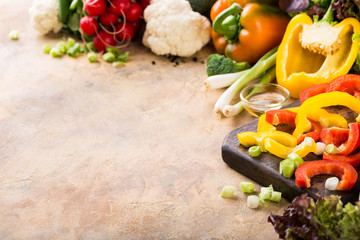 Organic healthy food background concept. Fresh raw colorful vegetables. Copy space.