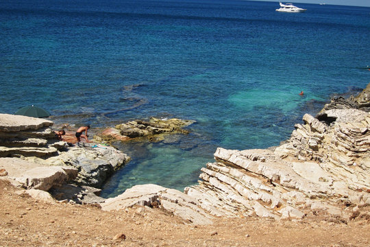 San Vito Lo Capo, Sicily - August 31, 2011: Tourists at Isulidda beach