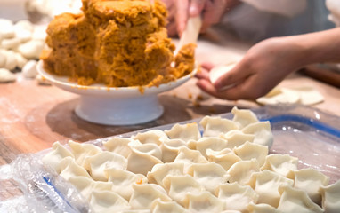 Chef is making dumplings