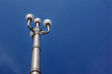 Fototapeta na wymiar lamp post street with dark blue sky