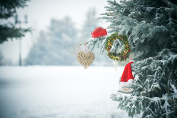 new year, heart and xmas decoration on christmas tree