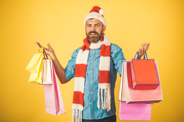 Christmas hipster shopper wear santa hat and scarf