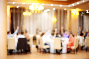 Blurred restaurant interior.