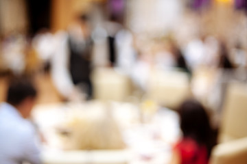 Blurred restaurant interior.