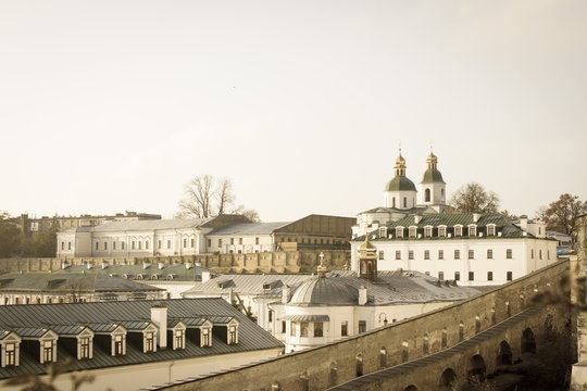Panoramic view of the distant and near caves of Kiev Pechersk Lavra monastery in Kiev, Ukraine. Kiev-Pechersk Lavra. Color toning. Old photo style.