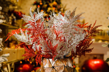 Christmas decoration elements consisting of glittering flowers