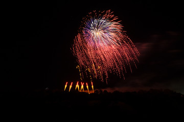 Giant bright exploding fireworks at huge celebration