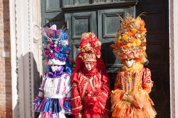 Fototapeta na wymiar Venice Italy Carnival costume mask with rich tissues and decorations.