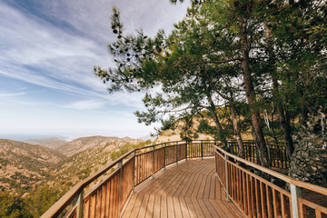 Fototapeta na wymiar Beautiful view from wooden bridge on mountains and sea