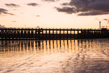 Obraz premium Sunset in Newhaven harbour near Seaford, East Sussex, England, selective focus