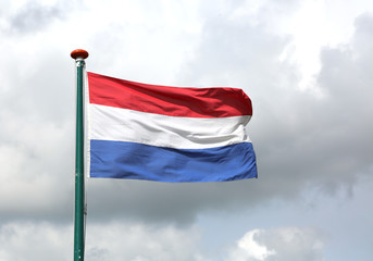 Fototapeta na wymiar Dutch flag waving with blue sky