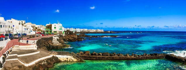 Traditional fishermen village Punta Mujeres with natural swimming pools. Lanzarote, Canary islands - obrazy, fototapety, plakaty