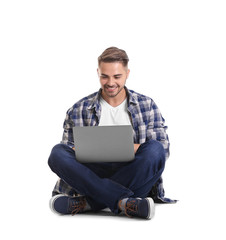 Young man with laptop, isolated on white