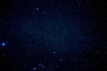 Fotobehang Night sky with shiny stars © mantinov